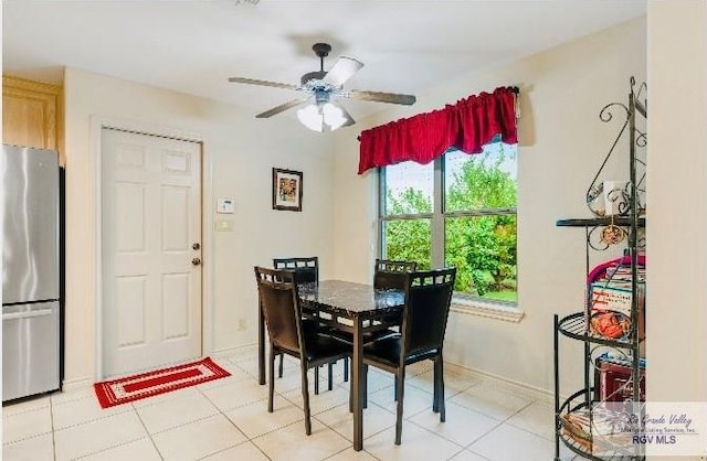 dining room featuring ceiling fan and light tile patterned floors