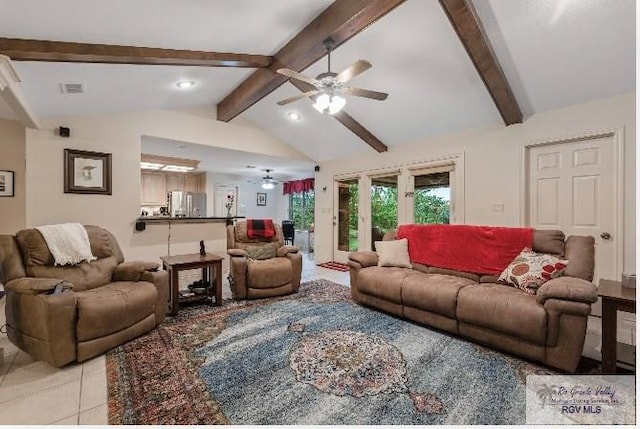 tiled living room with ceiling fan and lofted ceiling with beams