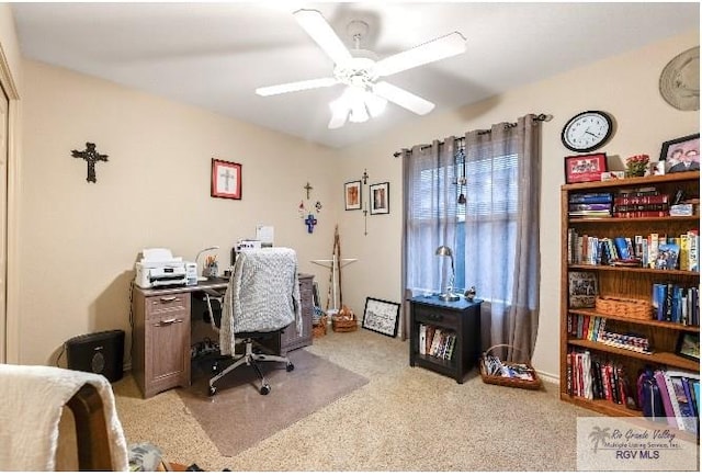 office area with ceiling fan and light colored carpet