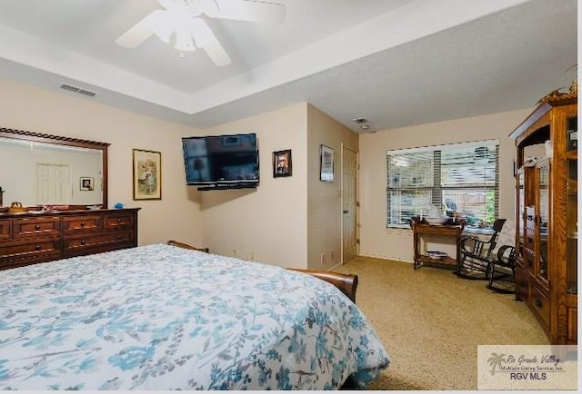 bedroom featuring ceiling fan and light colored carpet