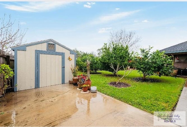 view of outbuilding with a lawn