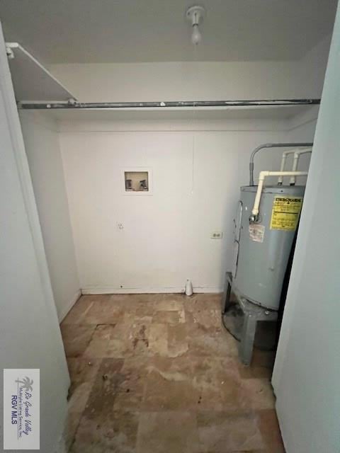 laundry area featuring washer hookup and electric water heater