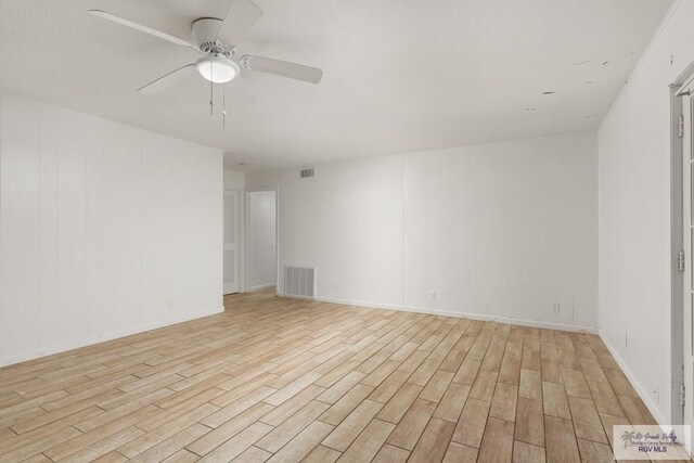 unfurnished room with light hardwood / wood-style floors and ceiling fan