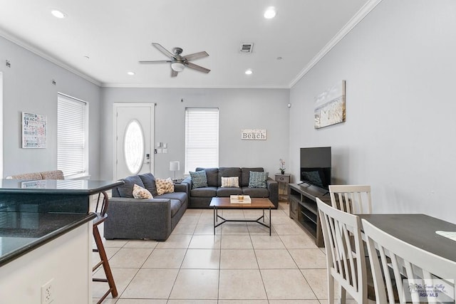 131 E Saturn Ln, South Padre Island, TX 78597 - living room featuring crown molding, a ceiling fan, recessed lighting, and light tile patterned flooring