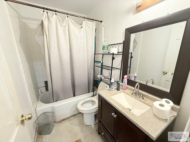 full bathroom with vanity, toilet, and shower / tub combo with curtain