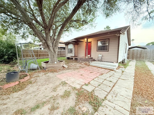 view of front of home featuring a patio