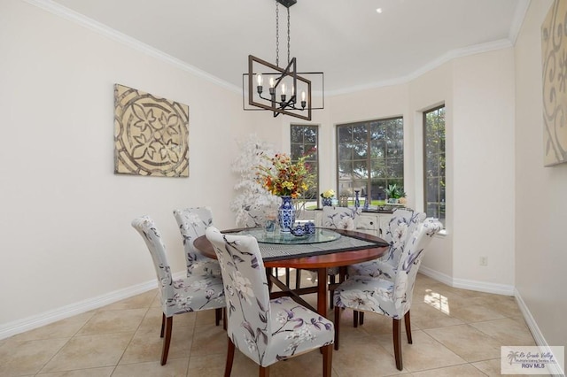 dining space featuring a notable chandelier, light tile patterned floors, and crown molding