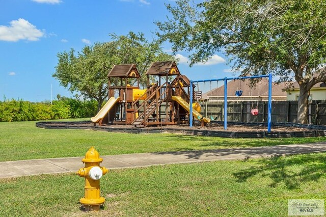 view of playground featuring a yard