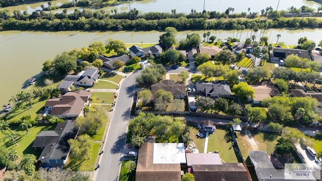 drone / aerial view with a water view