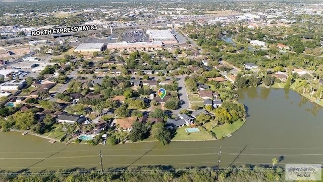 bird's eye view with a water view