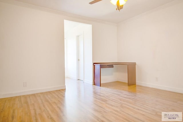 unfurnished room featuring ceiling fan, ornamental molding, and light wood-type flooring