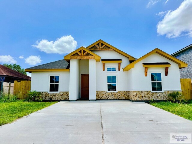 2708 Naples St, Brownsville, TX 78520 - view of front facade with stucco siding and stone siding
