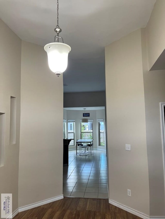 hallway featuring dark wood-type flooring