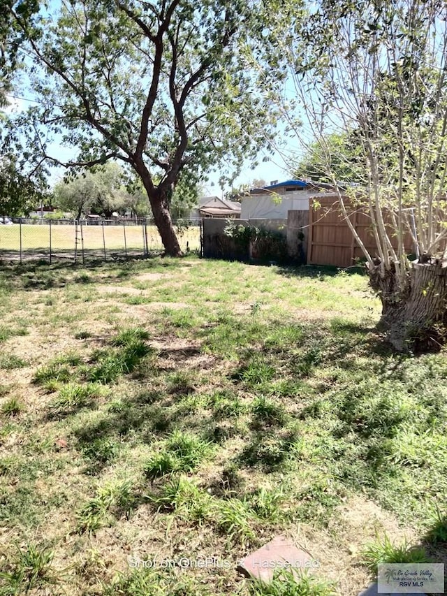 view of yard with fence