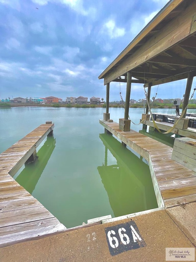 view of dock with a water view