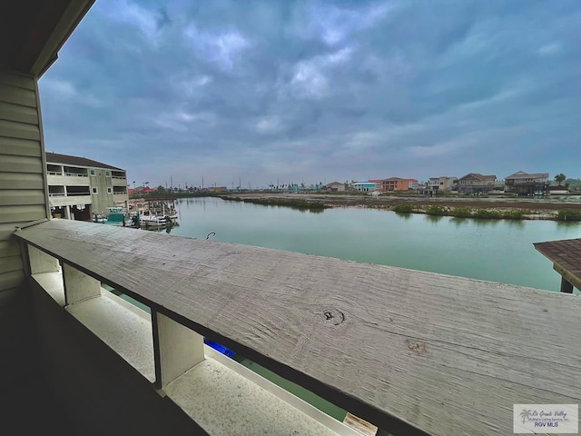 dock area featuring a water view