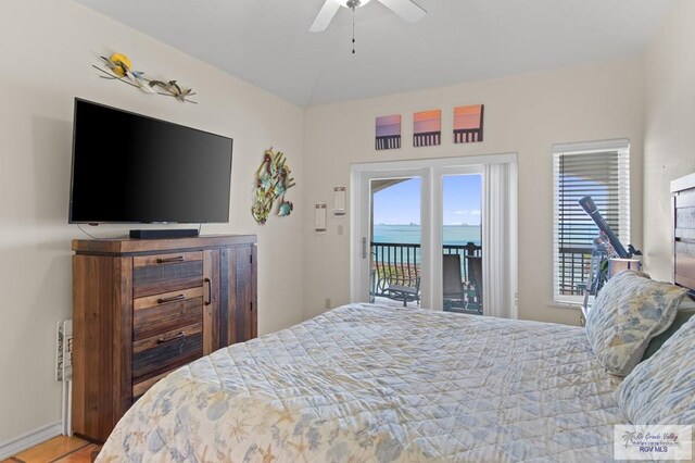 301 Houston Ave Unit 3402, Port Isabel, TX 78578 - bedroom featuring access to outside, multiple windows, and ceiling fan