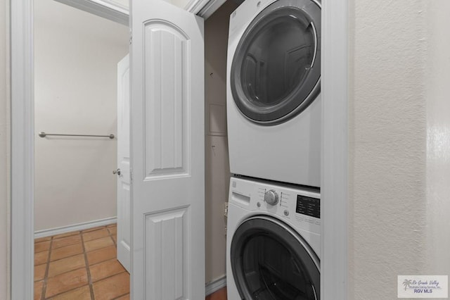 301 Houston Ave Unit 3402, Port Isabel, TX 78578 - washroom featuring stacked washer / drying machine and tile patterned flooring