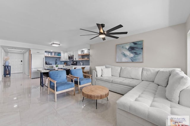 living room featuring ceiling fan