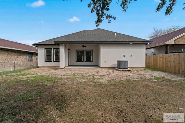 back of house with a patio, a yard, cooling unit, and ceiling fan