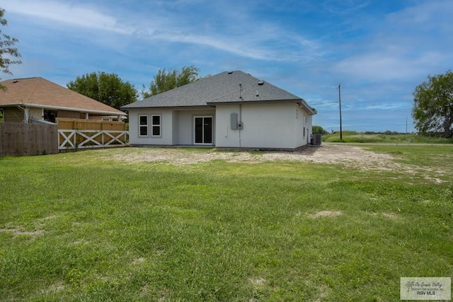 21929 Hand Rd, Harlingen, TX 78552 - back of house featuring central air condition unit