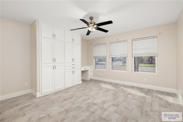 unfurnished bedroom with light hardwood / wood-style floors and ceiling fan