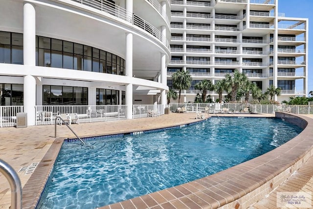 view of pool with a patio