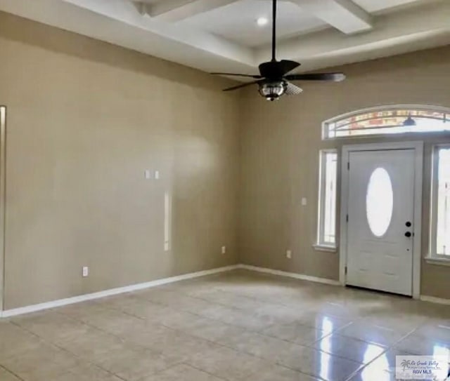 401 S Tamm Ln, Harlingen, TX 78550 - foyer entrance with light tile patterned flooring, coffered ceiling, beam ceiling, and ceiling fan