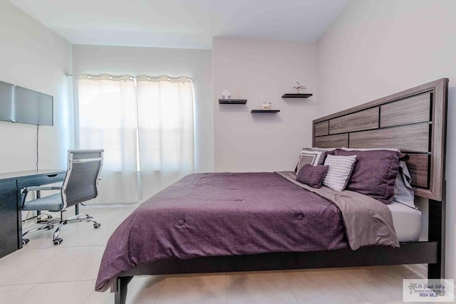 bedroom featuring tile patterned floors