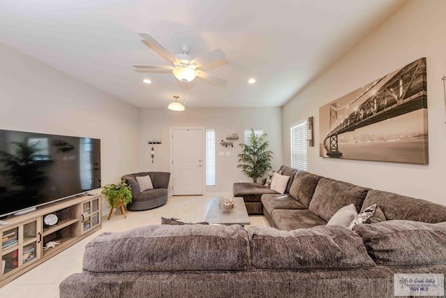 living area with ceiling fan, recessed lighting, and tile patterned floors