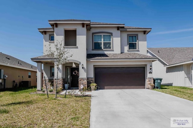 view of front facade featuring stucco siding, concrete driveway, a front yard, a garage, and stone siding