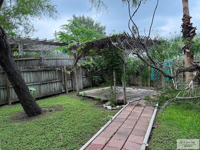 38 Palmetto Cir, Brownsville, TX 78521 - view of yard with a pergola