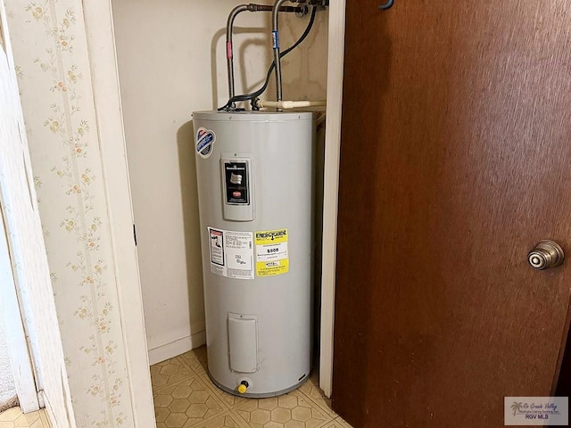 38 Palmetto Cir, Brownsville, TX 78521 - utility room featuring water heater