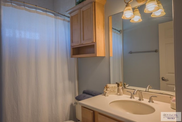 full bathroom featuring vanity and a shower with shower curtain