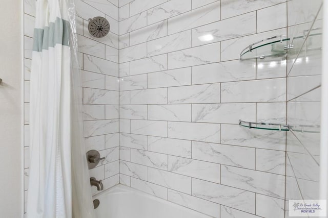 full bathroom with shower / tub combo with curtain