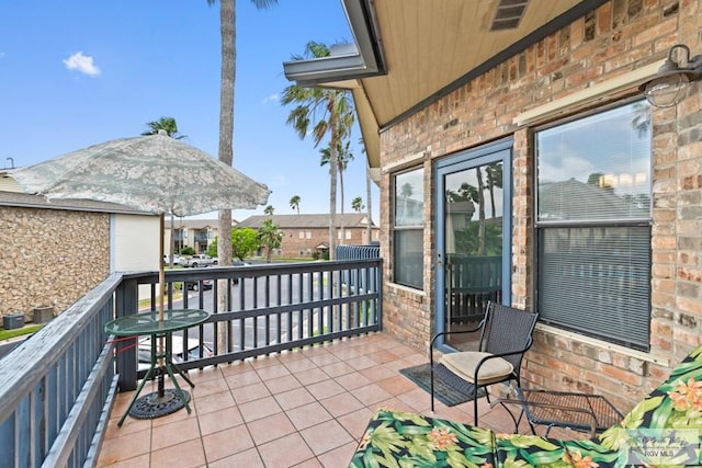 view of patio / terrace with visible vents and a balcony