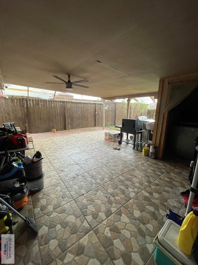 view of patio / terrace featuring ceiling fan