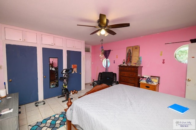 307 W Boone Ave, Pharr, TX 78577 - bedroom with light tile patterned floors and a ceiling fan