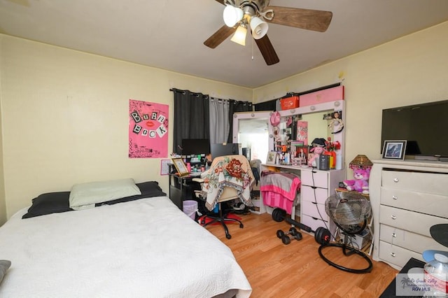 307 W Boone Ave, Pharr, TX 78577 - bedroom with wood finished floors and ceiling fan