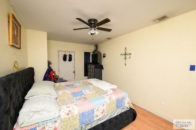 307 W Boone Ave, Pharr, TX 78577 - bedroom featuring wood finished floors and ceiling fan