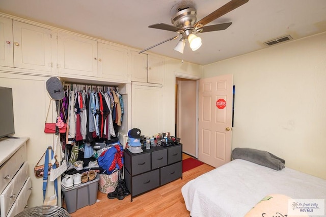 307 W Boone Ave, Pharr, TX 78577 - bedroom with light wood finished floors and a ceiling fan