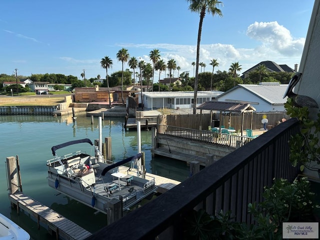 dock area featuring a water view