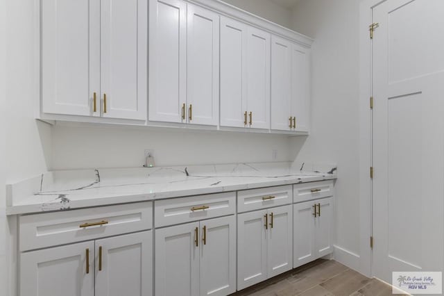 1305 Thacker Ln, Harlingen, TX 78552 - bar area featuring wood finished floors