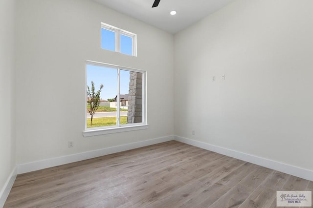1305 Thacker Ln, Harlingen, TX 78552 - spare room with a ceiling fan, light wood-style floors, baseboards, and recessed lighting