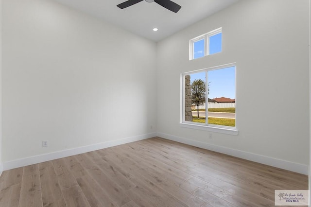 1305 Thacker Ln, Harlingen, TX 78552 - empty room featuring ceiling fan, wood finished floors, baseboards, and recessed lighting
