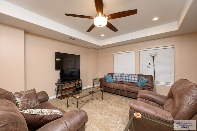 23314 Grapefruit Ave, Harlingen, TX 78552 - living area featuring ceiling fan, recessed lighting, and a raised ceiling