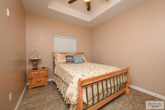 23314 Grapefruit Ave, Harlingen, TX 78552 - carpeted bedroom with a tray ceiling and ceiling fan
