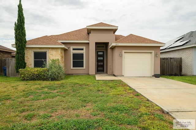 23314 Grapefruit Ave, Harlingen, TX 78552 - prairie-style house with a garage, stucco siding, concrete driveway, and a shingled roof