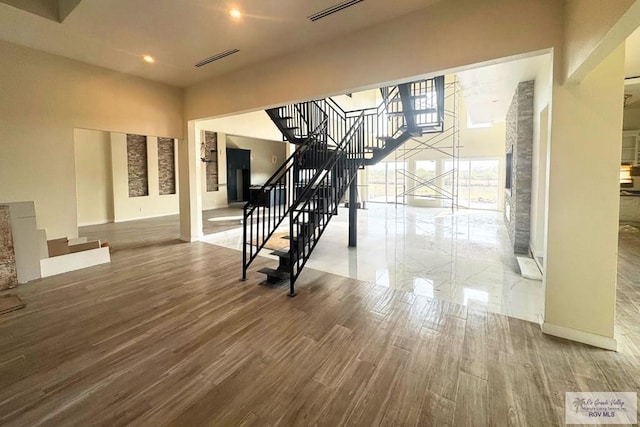 interior space with hardwood / wood-style floors