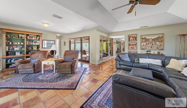 living room with tile patterned flooring, ceiling fan, visible vents, and ornamental molding